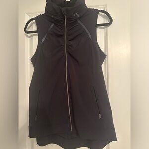 Running windbreaker vest with hood.